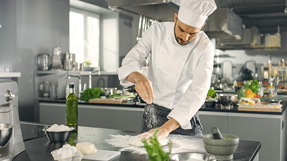 Chef preparing food in a kitchen